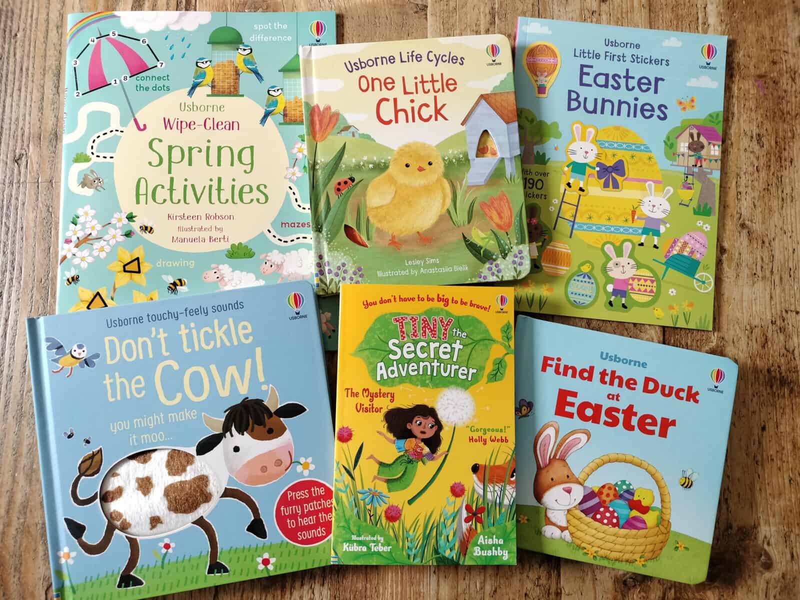 Set of 6 books about Spring and Easter from Usborne books laid out cover up on a wooden table.